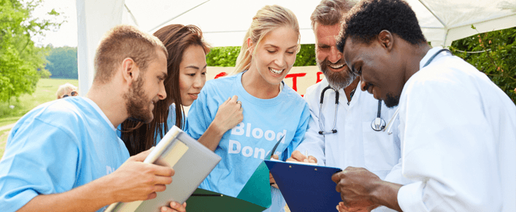 a group of volunteers at a blood drive