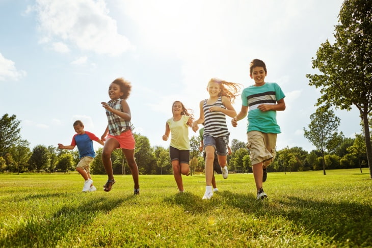 Children running and playing outside